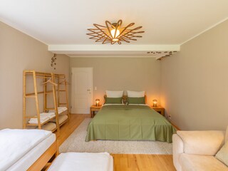 Spacious bedroom #1 with 4 beds