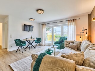 Wohn-/Esszimmer mit Terrasse