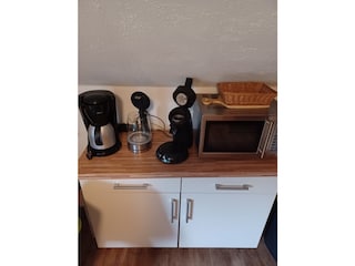 Küche  mit Cafemaschine und Tapmaschine