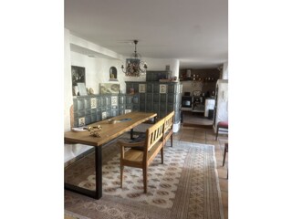 Kitchen with seating area and fireplace