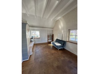 Living room other side with sleeping couch