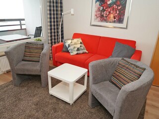 Wohnzimmer mit Schlafsofa