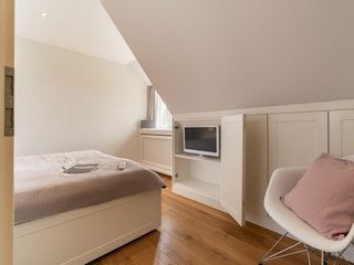 Im zweiten Schlafzimmer gibt es einen Fernseher...