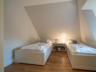 Das zweite Schlafzimmer im Obergeschoss...