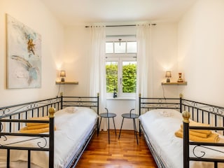 Schlafzimmer 3 im EG