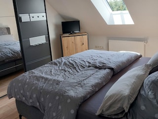 Schlafzimmer mit Doppelbett