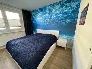 Schlafzimmer mit Doppelbett