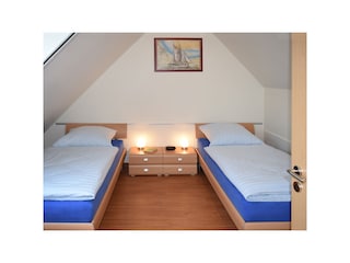 Zweites Schlafzimmer auf der zweiten Ebene