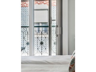 bedroom with balcony