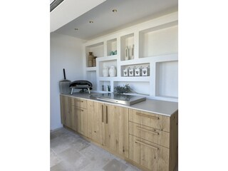 Outdoorküche mit Plancha u Pizza Ofen