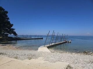 Strand, kristallklares Meer