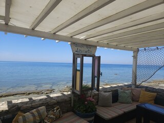 Strandbar, kristallklares Meer