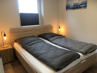 Schlafzimmer mit Doppelbett
