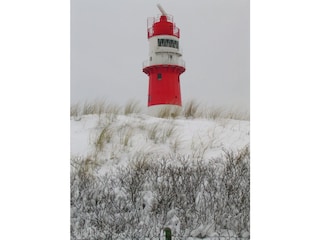 elektrischer Leuchtturm im Winter