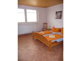 Bedroom with a double bed at the ground floor