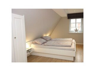 Das dritte Schlafzimmer mit Doppelbett 180x200cm....
