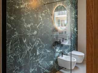 Dark green" bathroom