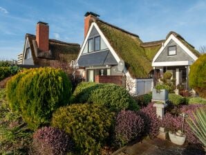 Casa vacanze "Am hohen Ufer", Reetdach-Haus "Happy Haus"