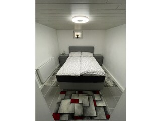 Doppelbett im Schlafzimmer