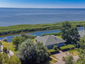 Maison de vacances "The waterfront cottage" - Ferienhaus am Meer