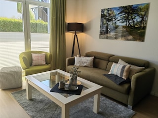 Wohnzimmer mit Zugang zur Terrasse