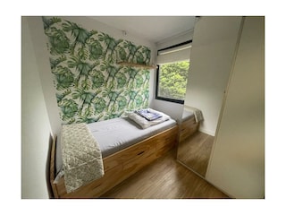 Schlafzimmer 2 mit einem Einzelbett