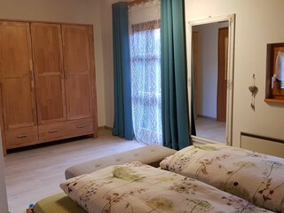 Schlafzimmer mit Balkon
