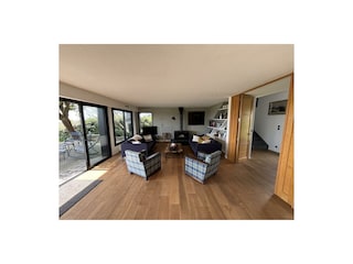 Wohnraum mit Salon und Holzofen