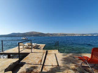 Stone pier on the sea