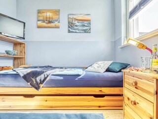 Einzelbett im kleineren Schlafzimmer