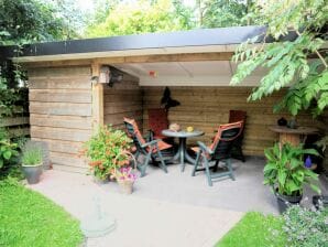 Casa vacacional Nett eingerichtetes Sommerhaus, neben Hauptbewohner mit Veranda, Eriksstraat 8,