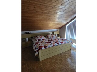 Schlafzimmer mit Balkon