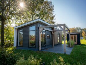 Ferienhaus Maison de luxe entourée d'eau et de forêt