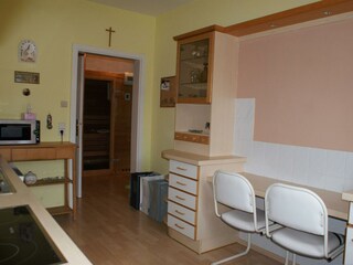 Ferienwohnung Kollmann - Küche mit Sitzgelegenheit