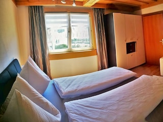 Ferienwohnung Etschbacher - Schlafzimmer