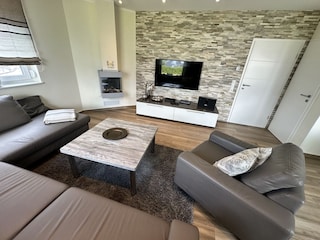 Wohnbereich mit SkyFlatTV, Gaskamin,  Bose Soundsystem