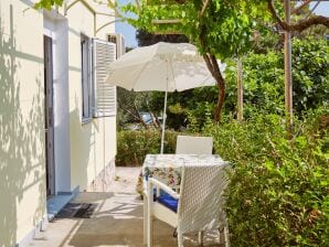 Ferienwohnung LEONY avec jardin à 50m de la plage à Mali Losinj