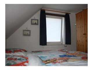 Schlafzimmer mit Doppelbett