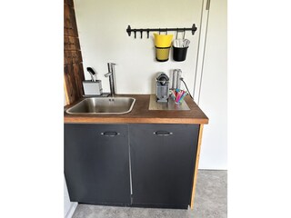 Kitchenette with dishwasher