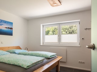 Schlafzimmer mit Doppelbett