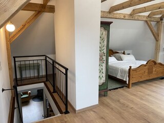 Treppenaufgang und Dachgeschoß