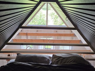 romantischer Schlafbereich mit Doppelbett
