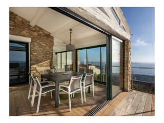 Verrière donnant sur terrasse cuisine et séjour