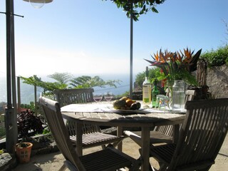 Dining area on the sun terrace with with view of the Atlantic