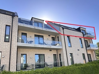 Gebäude-Seitenansicht mit markierter Wohnung