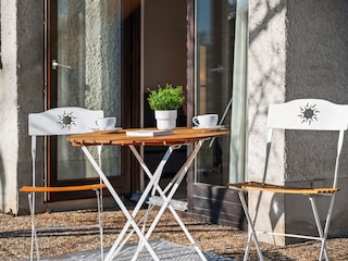 Außenbereich mit Sitzgelegenheiten