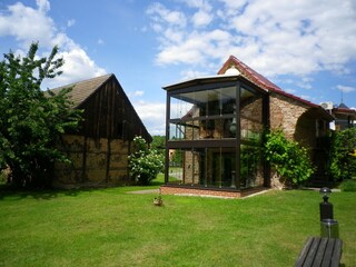 Landhaus-Suite zum See - Außenansicht Wintergarten