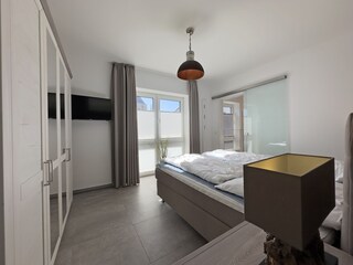 Schlafzimmer 1 mit Zugang zum Duschbad  Dünenhus