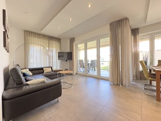 Wohnzimmer Dünenhus mit Balkon