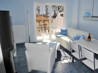 Wohnbereich mit Sofa und Sessel